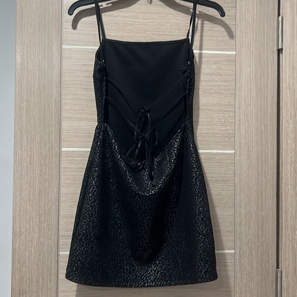 a black silver cheetah print dress. backless with adjustable strings in the back - Picture 1 of 5